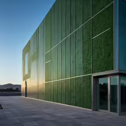 a building that has grass covering the sides