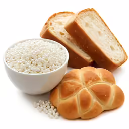 some breads and some little white seeds are shown
