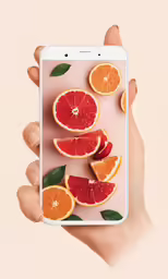 an image of fruit is on a cell phone