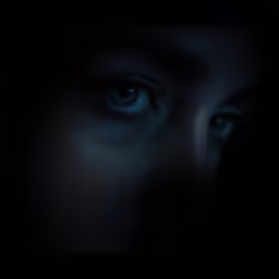 a close up of a person in the dark with an illuminated eye