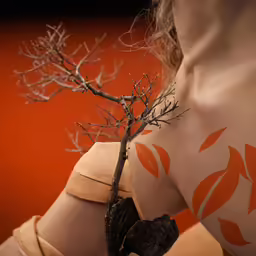 there is a tattoo design on the girl