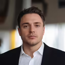 an image of a man looking off in the distance
