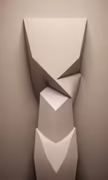 a stylized abstract paper sculpture is on display