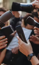 someone holding a microphone to sing a song