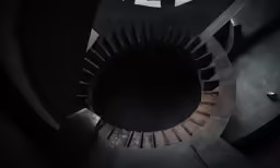 a spirally staircase is seen from above