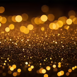 a gold colored background of round objects