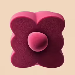 a flower made from different colored foam pieces