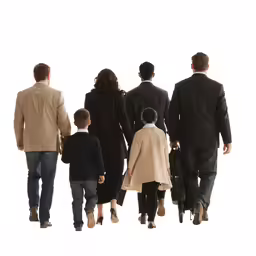 a family of four walking with a suitcase