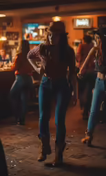 two women in cowboy clothing standing together
