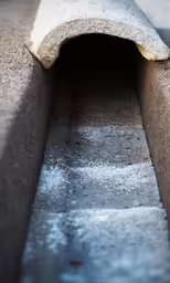 the bottom of a concrete bench and its base