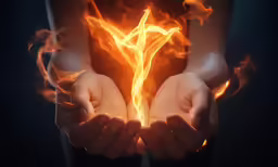 flames are spread from the palms of hands