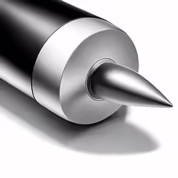 a metal pen with a long pointed tip