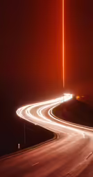 car light trails on a highway at night