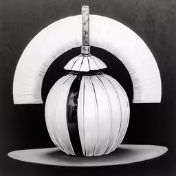 a statue of an orb shaped object on a black background