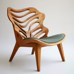an old style chair with a curved seat