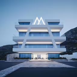 a futuristic building is lit up at night