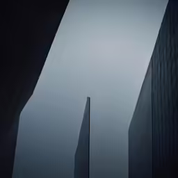 a couple of tall buildings next to each other