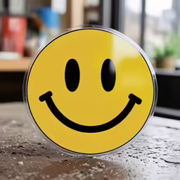 a smiley face made out of some tin foil
