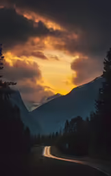 the sun is peeking over mountains towards the woods
