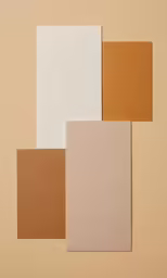 a selection of four pieces of paper on a brown background