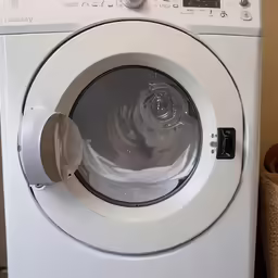an image of a dryer with the water in the window