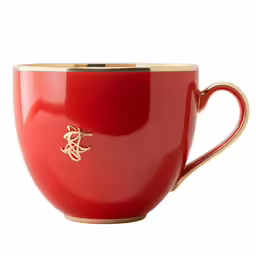a red cup with gold trim on a white background