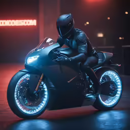 man on a motorcycle wearing all black riding it