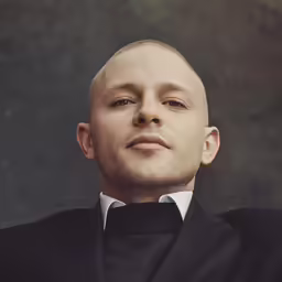 a man that has just been dressed up for a prom
