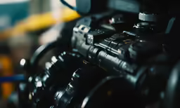 a large camera and some other items on display