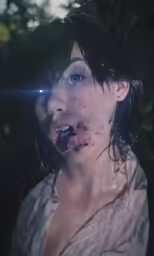 an extremely young woman poses for the camera
