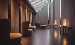 an indoor space is well lit by a vaulted skylight