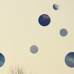 the balloons are flying through the sky very quickly