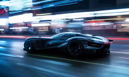a very nice car speeding down the road