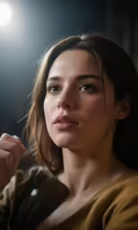 a beautiful young woman holding onto an object