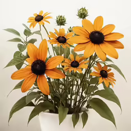 a vase filled with yellow flowers on top of a table