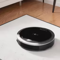 the roomba is clean on a hardwood floor