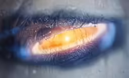 an artistic picture of a yellow orange eye
