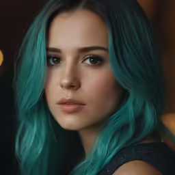 a woman with blue hair and green eyes is posing for a photo