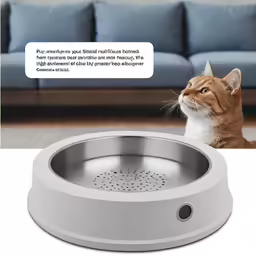 a cat with its head inside an electronic litter box