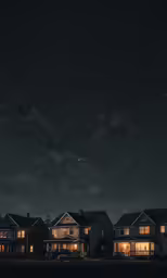 a house lit up at night by lights