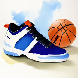 two tennis shoes and a basketball on a white surface