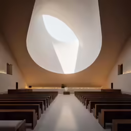 there is a view of the inside of a building from the back of it