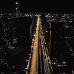 the street is lit up with many lights