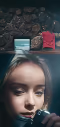 a woman holding her camera and staring off to the right