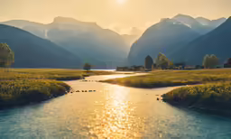 a mountain landscape is in the sunlight near a small stream