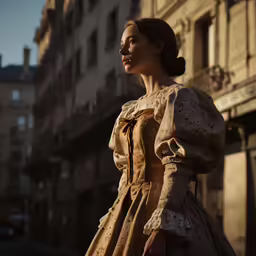 a woman standing in front of a building wearing a dress