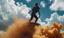 a young woman on a hill with her hand outstretched toward the sky