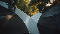a curved curved design made from cement on a hillside