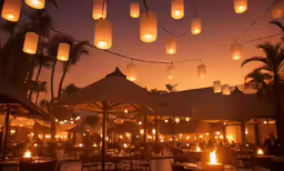 chinese lanterns are hung from an outdoor restaurant