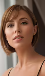 a woman wearing a black dress and a necklace